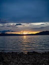 View of the boat seat,Sea storm landscape. Dramatic overcast sky.Sunset sky, The lake at sunset Royalty Free Stock Photo