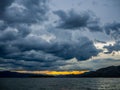 View of the boat seat,Sea storm landscape. Dramatic overcast sky. Sunset sky Royalty Free Stock Photo