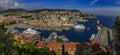 View of boats, coastline and traditional houses in Lympia port on the Mediterranean Sea, Cote d`Azur in Nice, France Royalty Free Stock Photo