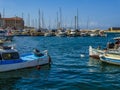 A view of boats moored in Chania harbour, Crete on a bright sunny day Royalty Free Stock Photo