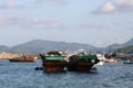 View Of Boats Moored At Harbor, Sai Kung Pier In Hong Kong 27 June 2004