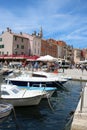 Boats, Rovinj harbor, Croatia, stalls behind