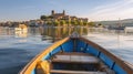 View through boats to city Marta on lake Bolsena in Italy, Generative AI Royalty Free Stock Photo