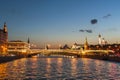 View of the Bolshoi Moskvoretsky bridge, Kremlin towers, the Grand Kremlin Palace, Ivan the Great Bell Tower in late evening. Royalty Free Stock Photo