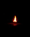the view of a bonfire burning beautifully at night