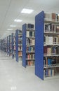 View of book shelves at a library Royalty Free Stock Photo
