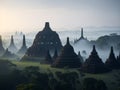 view of Borobudur temple in the morning, shrouded in mist