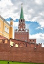 View of Borovitskaya Tower with Kremlin red brick wall from Alexander Garden in Moscow Royalty Free Stock Photo