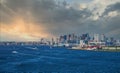 View of Boston from Harbor Under Sunset Sky Royalty Free Stock Photo