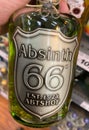 View on bottle absinth 66 in front of shelf in german supermarket Royalty Free Stock Photo