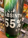 View on bottle absinth 55 % in front of shelf in german supermarket Royalty Free Stock Photo