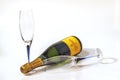 View of bottle of authentic french brut champagne Veuve Clicquot and two slim, tall and elegant champagne glasses.