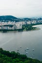 View from bottom of Sugarloaf mountain just dusk overlooking boats on Guanabara bay Royalty Free Stock Photo