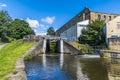 A view from the bottom of three locks gates on the Leeds, Liverpool canal at Bingley, Yorkshire, UK