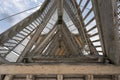 View from the bottom up into a wooden tower construction