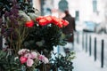 View of a bouquet of scarlet roses in a street flower shop in Paris Royalty Free Stock Photo