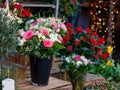 View of a bouquet of scarlet roses in a street flower shop in Paris Royalty Free Stock Photo