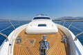 Bow of a luxury motor yacht cruising the blue sea. Royalty Free Stock Photo