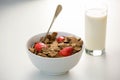 View of a bowl of cereals and glass of milk Royalty Free Stock Photo