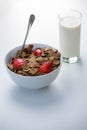 View of a bowl of cereals and glass of milk Royalty Free Stock Photo