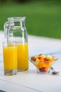 View of bowl of fruit salad and orange juice Royalty Free Stock Photo