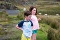 Boy and girl walking up the Slieve League Cliffs, County Donegal, Ireland