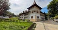 View of a Brancovenesc style palace build with balcony and windows with circular arches. Building in Romanian Renaissance style