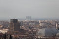 Brescia cityscape, buildings in fog, Lombardy, Italy Royalty Free Stock Photo