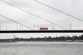 View at the bridge with a bus driving at the rhine riverbank in dÃÂ¼sseldorf germany Royalty Free Stock Photo