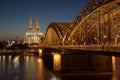 Cologne bridge by night dome Royalty Free Stock Photo