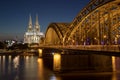 Cologne bridge by night dome Royalty Free Stock Photo