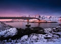 View on the bridge in the Hamnoy village, Lofoten Islands, Norway. Landscape in winter time during blue hour at sunrise. Mountains Royalty Free Stock Photo