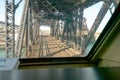 View of a bridge with train tracks over river Royalty Free Stock Photo