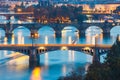 Bridges with historic Charles Bridge and Vltava river at night in Prague, Czech Republic Royalty Free Stock Photo