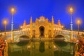 View of bridges and lights in Spain Square at evening, landmark in Renaissance Revival style, Seville, Andalusia, Spain Royalty Free Stock Photo