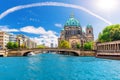 View of the bridges on the Spree and Attractive cathedral or Berliner Dom on Museum Island, Germany