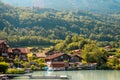 View of Brienz lake with clear turquoise water. Traditional wooden houses on the shore of Brienz lake in the village of Royalty Free Stock Photo