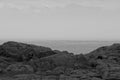 A black and white photo of the rocky coast of Nova Scotia. Royalty Free Stock Photo