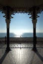 View of Brighton bandstand and the sun shining on a blue sea and blue sky, United Kingdom Royalty Free Stock Photo