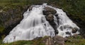 view of the broad upper Voringsfossen Waterfall near Fossli in central Norway Royalty Free Stock Photo
