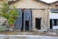 Broken sliding wooden doors on an old factory building Royalty Free Stock Photo