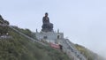 View of the bronze Buddha statue atop Mount Fansipan. Vietnam Royalty Free Stock Photo