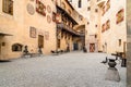 View of the Brunico Castle, situated on the hill over the old town, in Val Pusteria, Italy