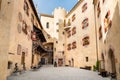 View of the Brunico Castle, situated on the hill over the old town, in Val Pusteria, Italy