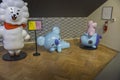 View of BT21 characters statues and warning sign not to touch them in BT21 store, New York,