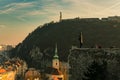 View from the Budapest castle towards the Gellert Hill, statue watching over the city in the foreground