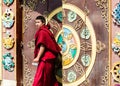 Buddhist monk at the door of Drubgon Jangchup Choeling Gompa  Kathesimbhu Stupa  Kathmandu  Nepal Royalty Free Stock Photo