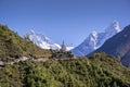 View of a Buddhist stupa with mountain Lhotse and Ama Dablam behind Royalty Free Stock Photo