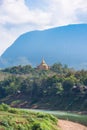 View of the buddhist temple on the mountain, Louangphabang, Laos. Copy space for text. Vertical. Royalty Free Stock Photo