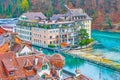 The view on the building on the barrier with a dam on Aare river in central Bern, Switzerland Royalty Free Stock Photo